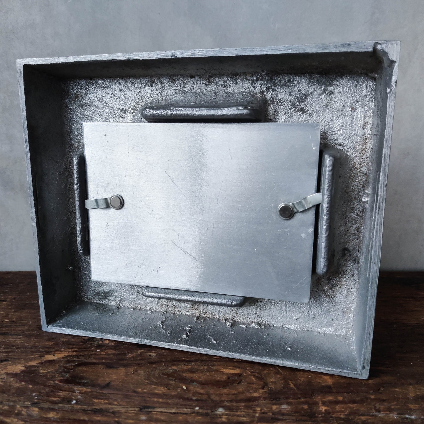 Vintage modernist cast aluminium freestanding sculptural picture frame