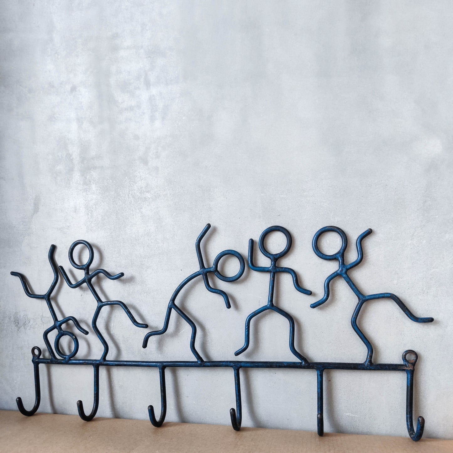 Vintage whimsical blue 1990s modernist figure hooks