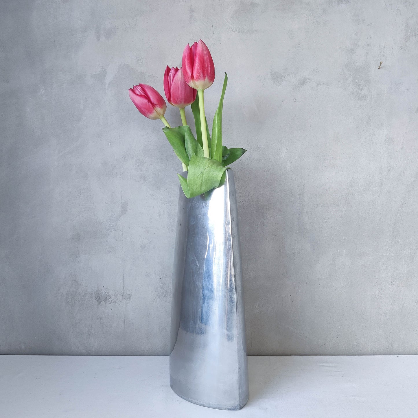 Vintage hand cast aluminium vase flat, sculptural silver metal