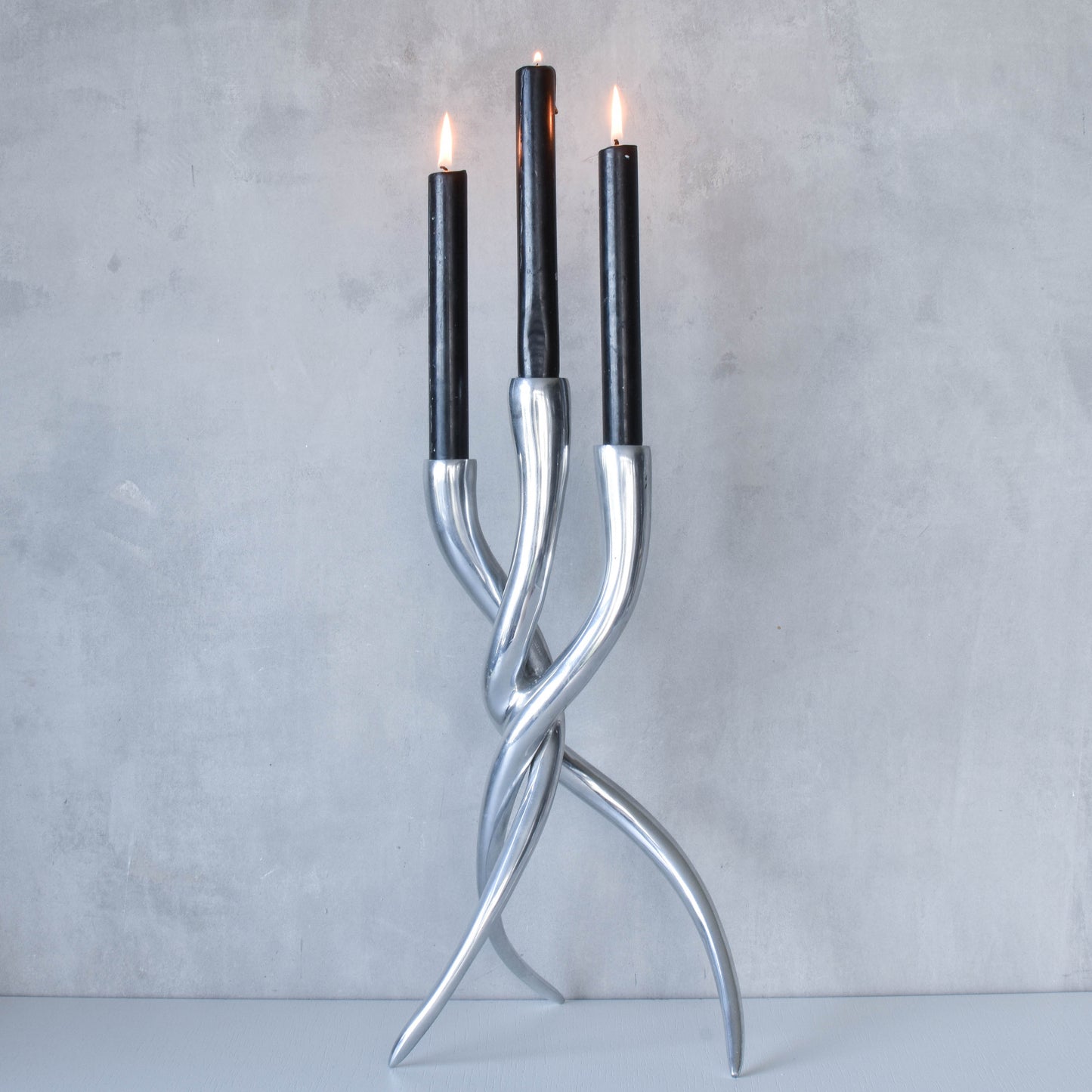 Cast aluminium brutalist style twisted sculptural candelabra