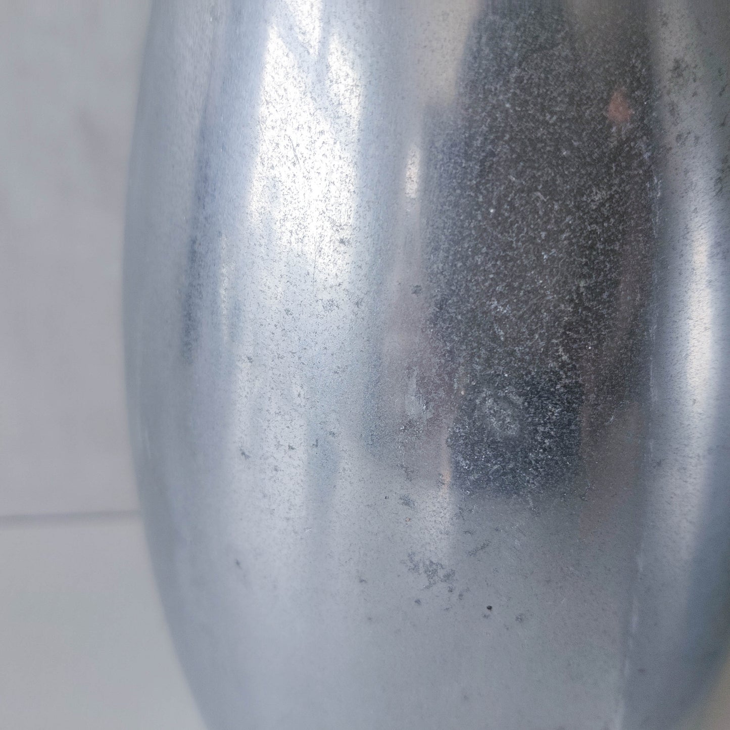 Pair of vintage cast aluminium modernist style sculptural bottles vases vessels 41cms