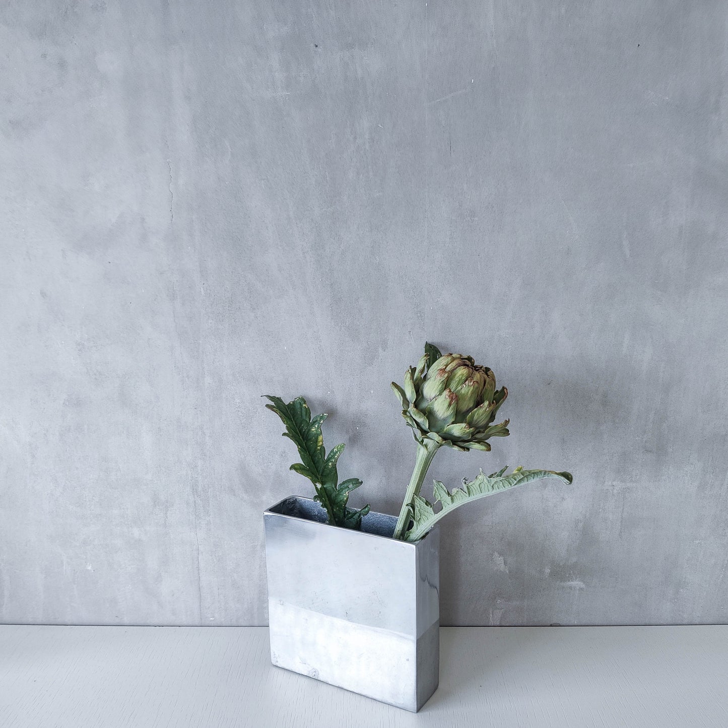 Vintage 00s modernist hand cast aluminium vase flat, sculptural silver metal