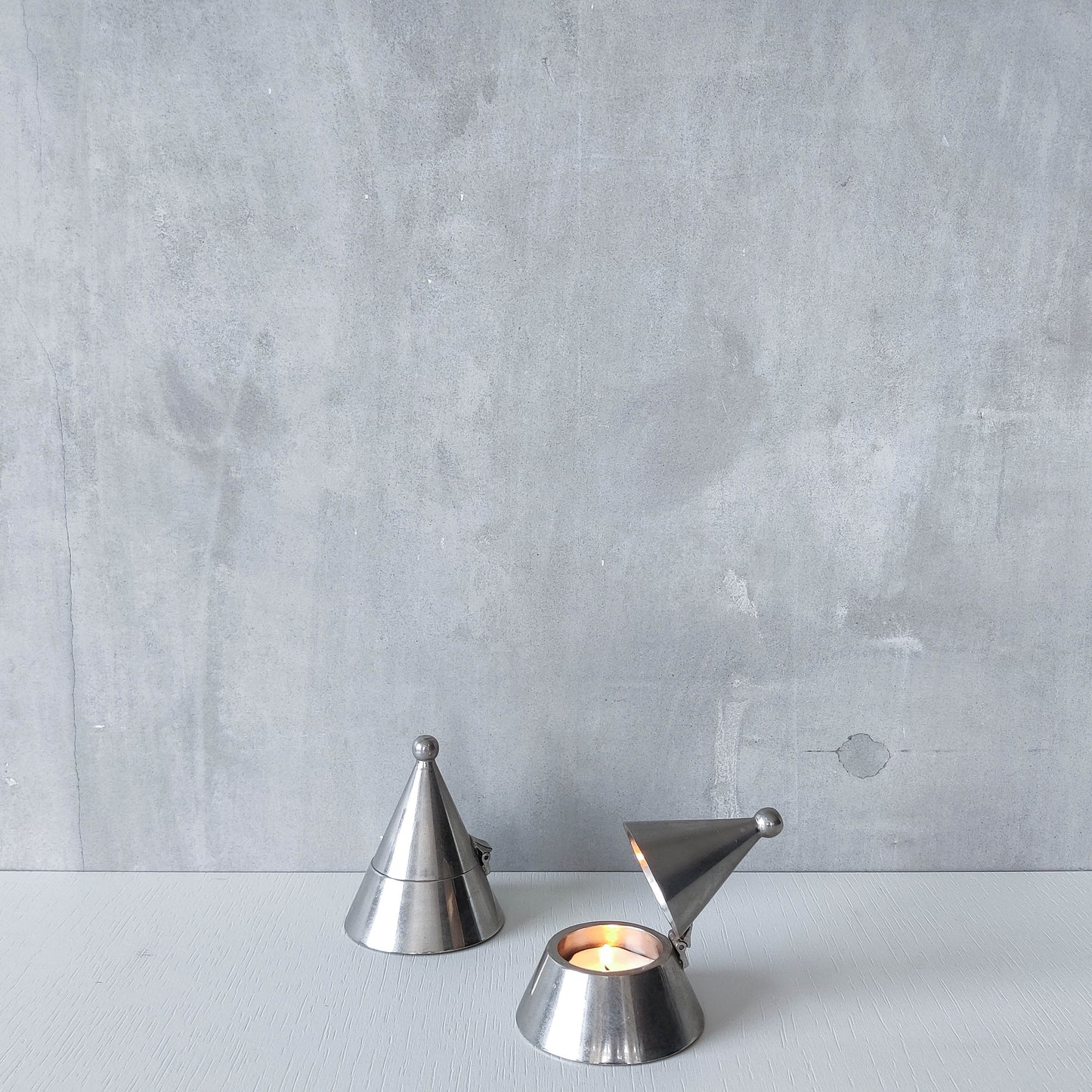 Pair of vintage conical silver chrome tea light holders Aldo Rossi Alessi modernist