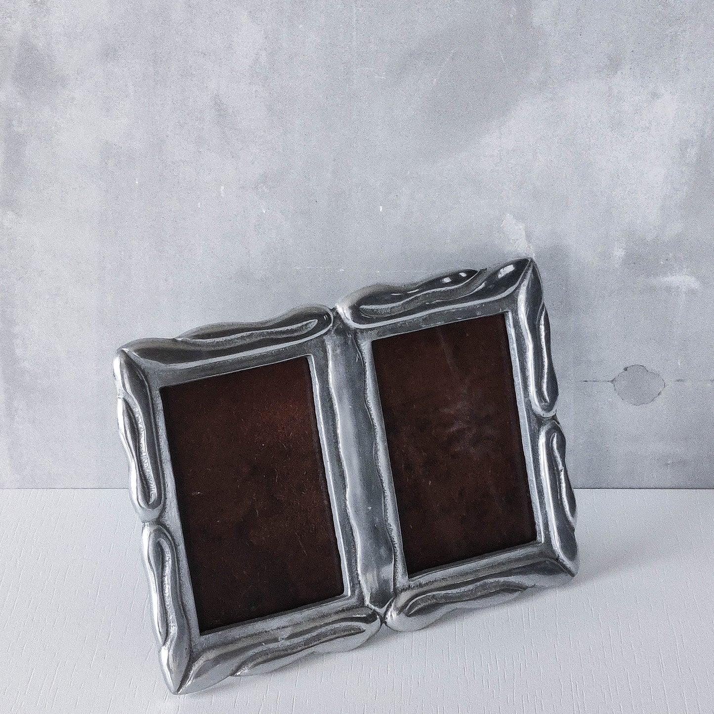 Vintage 1990s cast aluminium organic modernist form double picture photo frame