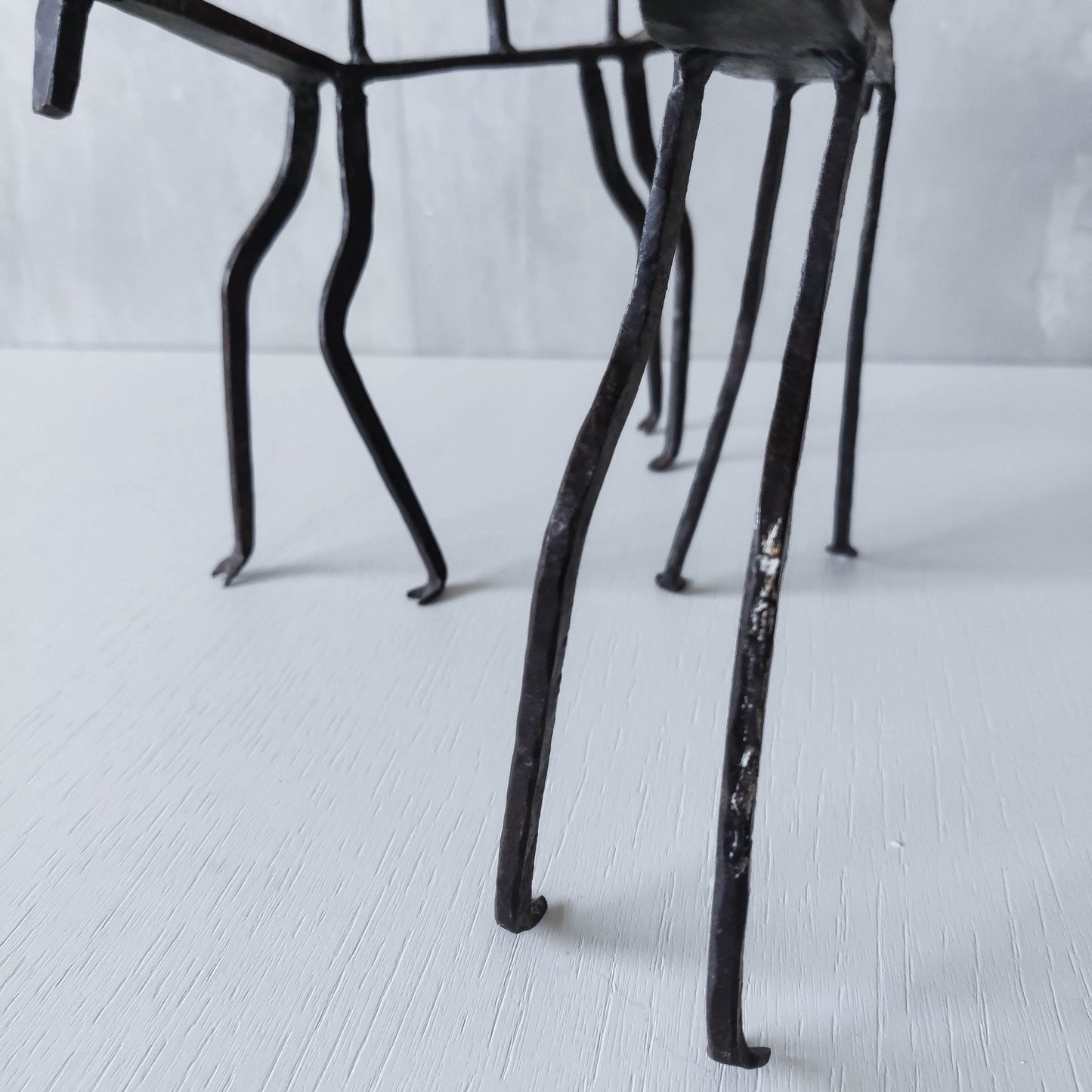 Pair of brutalist vintage wrought iron primitive antelope deer candelabras