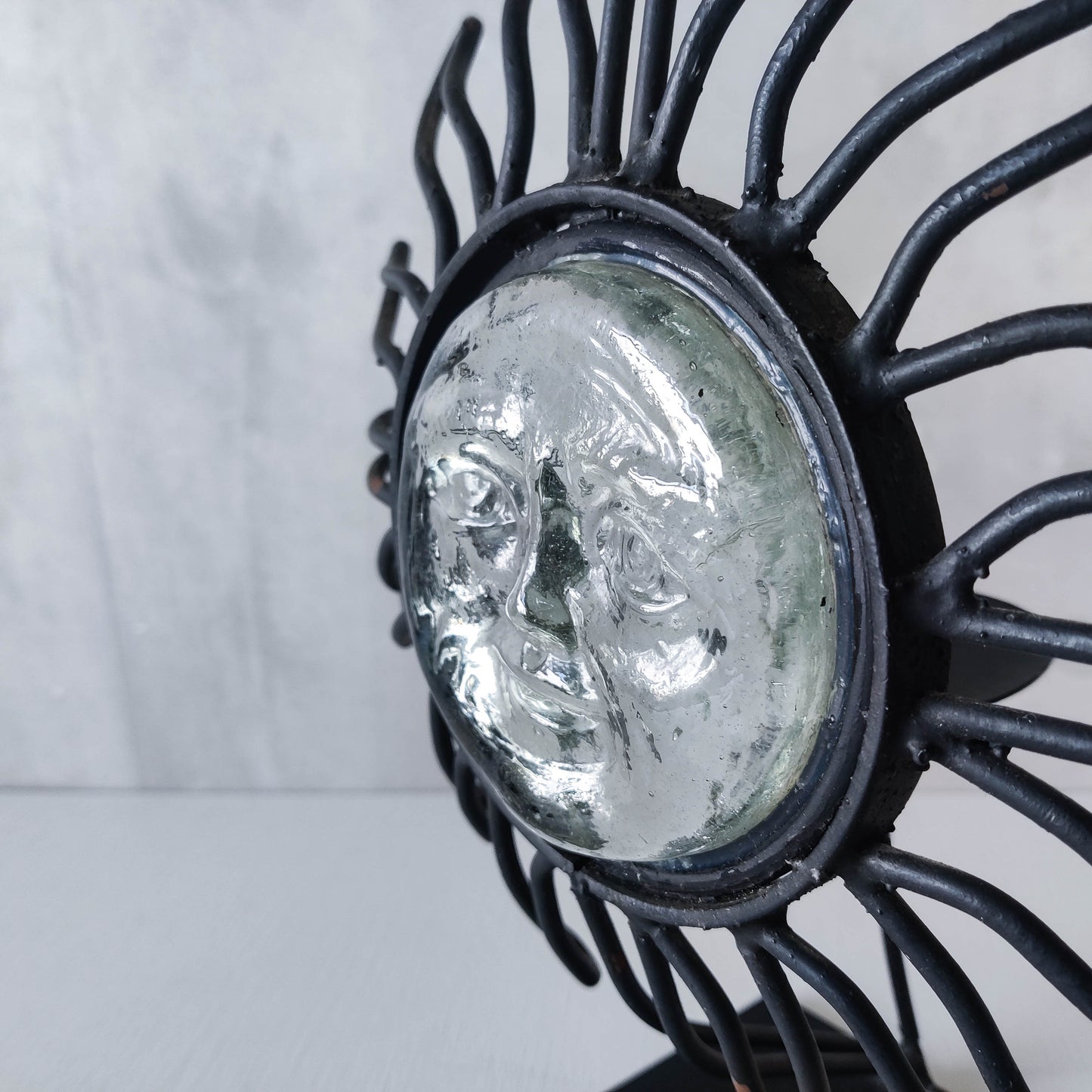 1990s celestial forged steel metal and cast glass sun face celestial candle holder