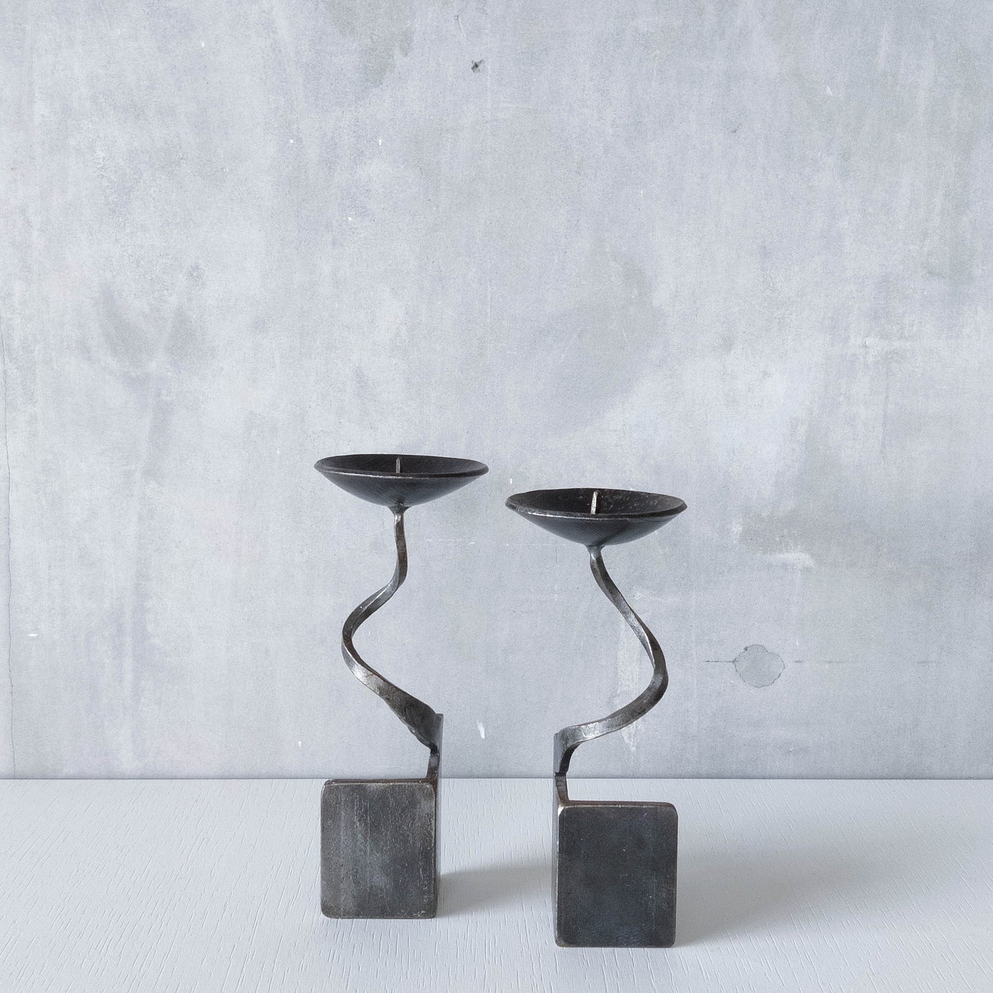 Pair of brutalist style metalwork forged steel sculptural candle holders