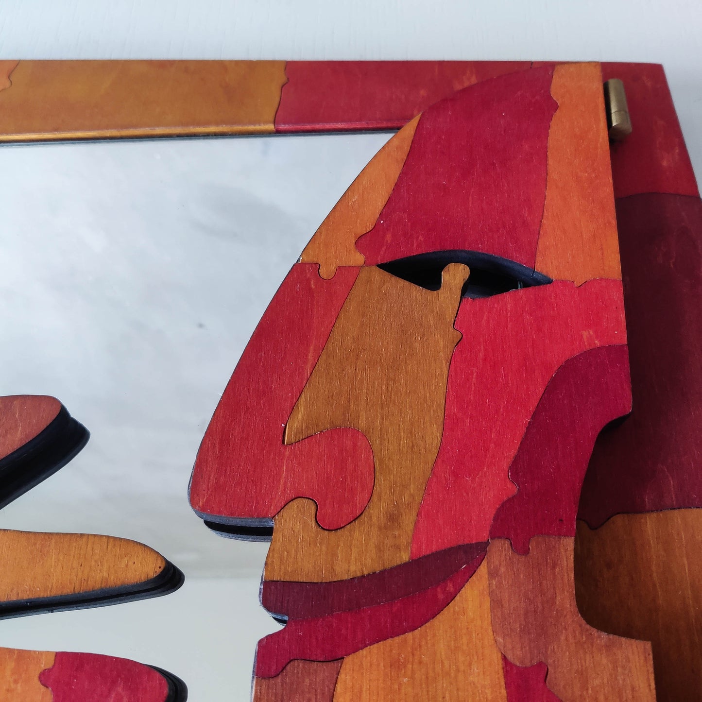 A vintage artist made modernist abstract puzzle mirror with hinged face and hand