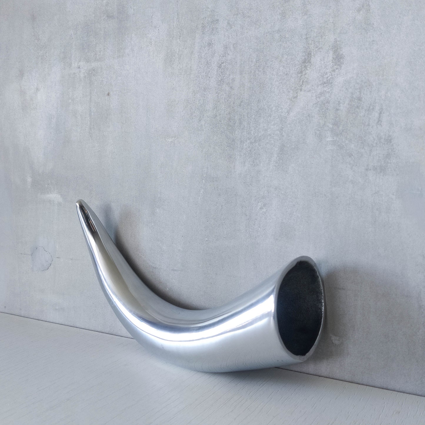 Cast aluminium sculptural wall pocket vase
