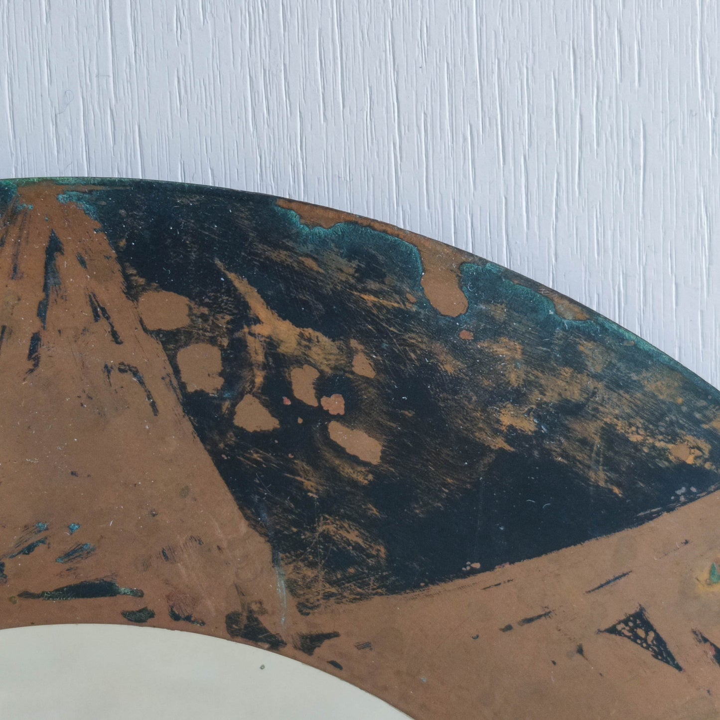Vintage handmade copper mirror with etched painterly star