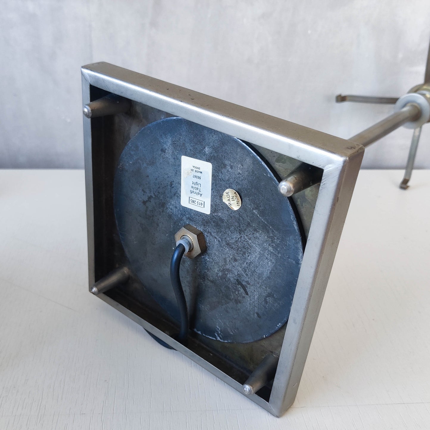 A pair of tall early 1990s Habitat 'Ashrafi' sculptural steel lamps