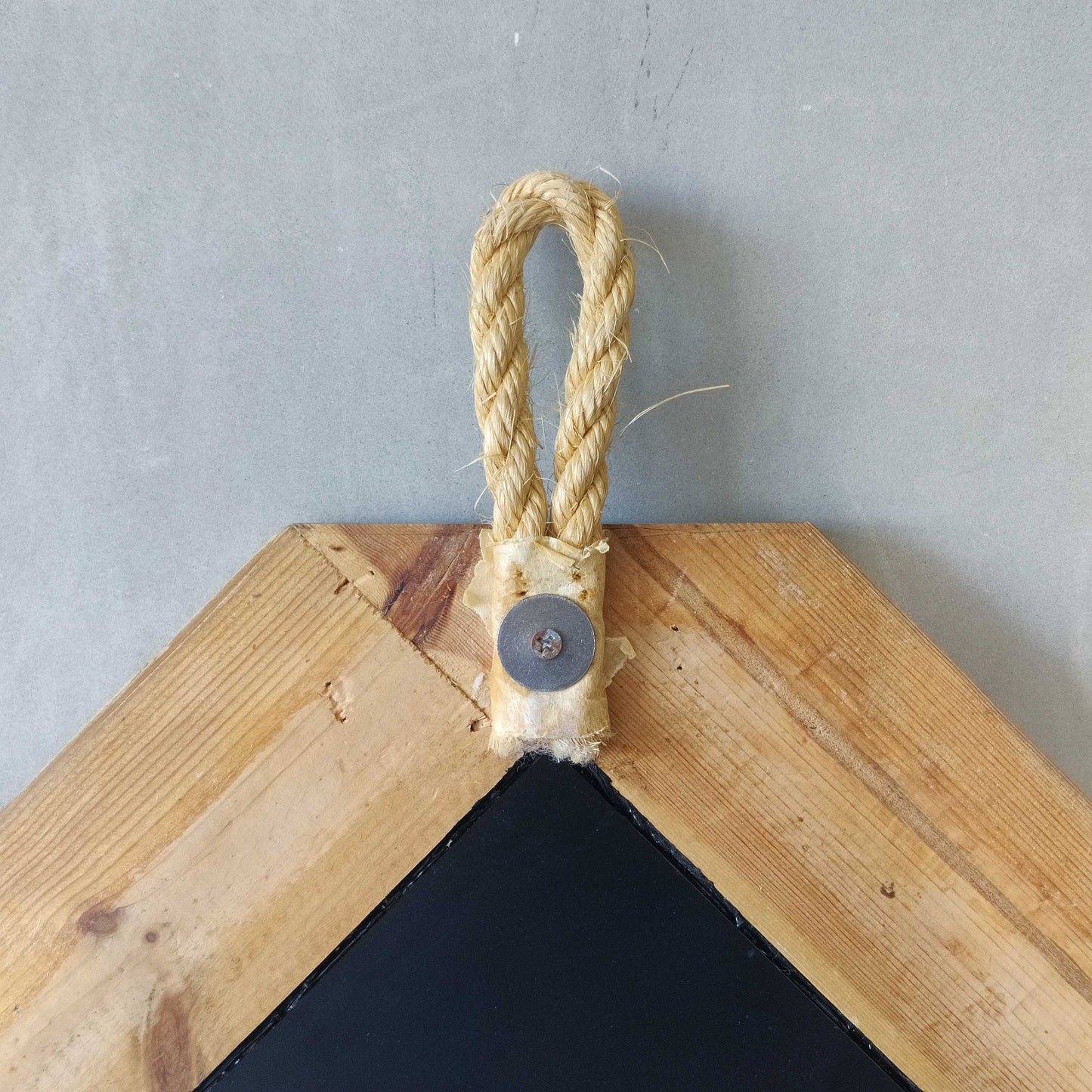 A 1990s pine framed leaded mirror with rope loop