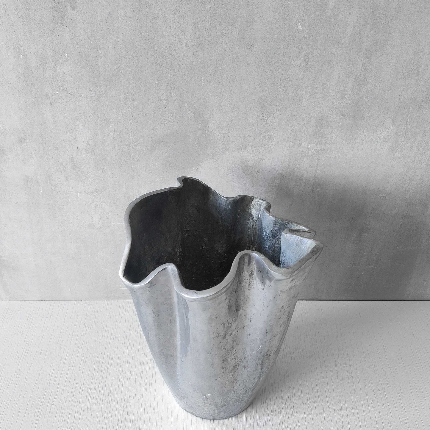 Cast aluminium vase