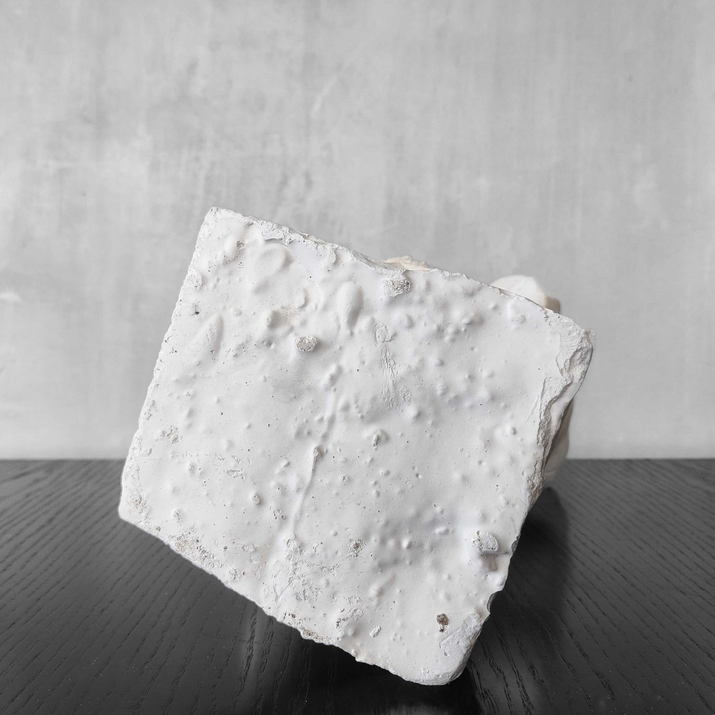 A large vintage studio plaster cast sculpture study of a female torso