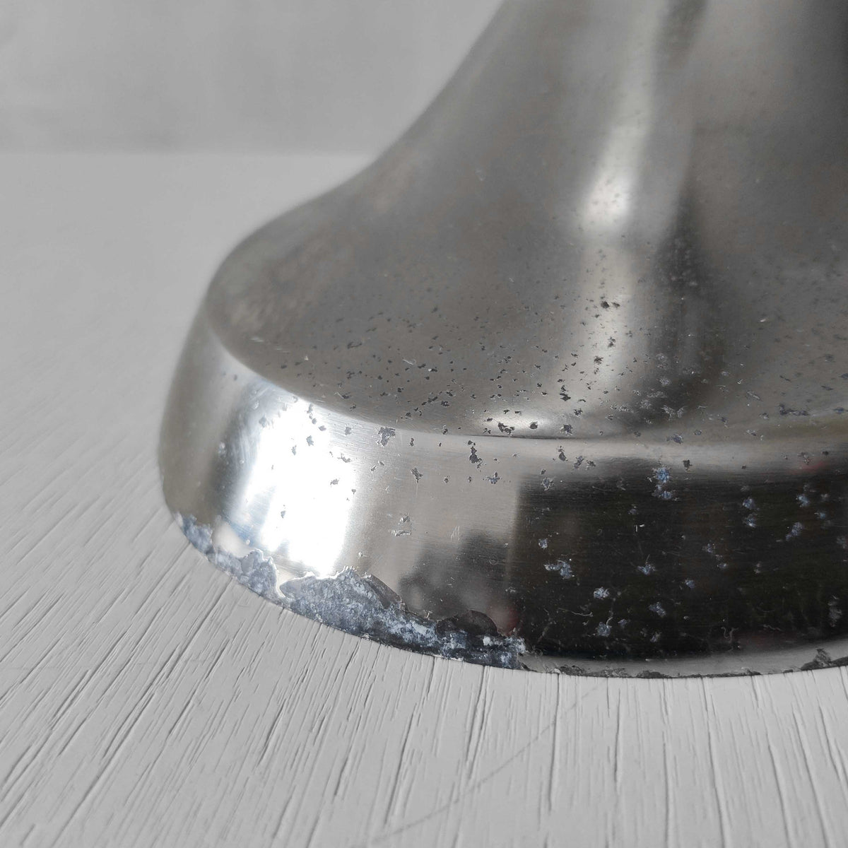 A vintage large cast aluminium sculptural urn profile vase