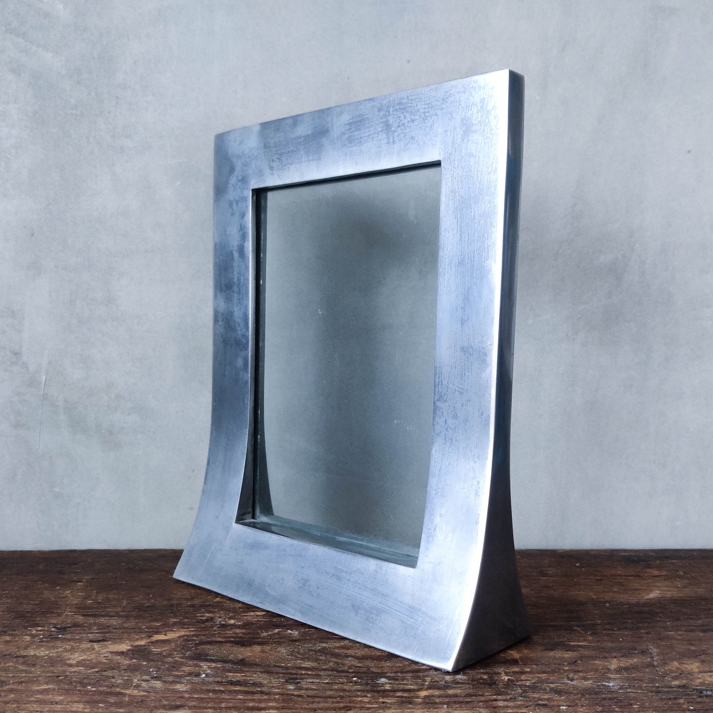 Vintage modernist cast aluminium freestanding double sided sculptural frame