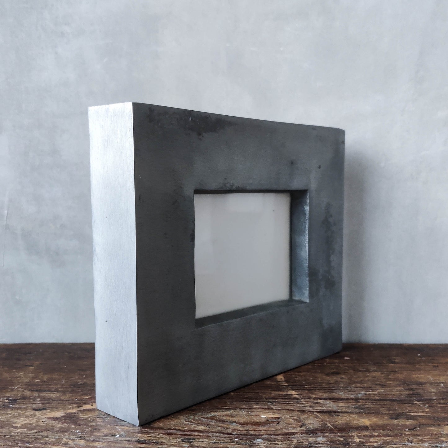 Vintage modernist cast aluminium freestanding sculptural picture frame