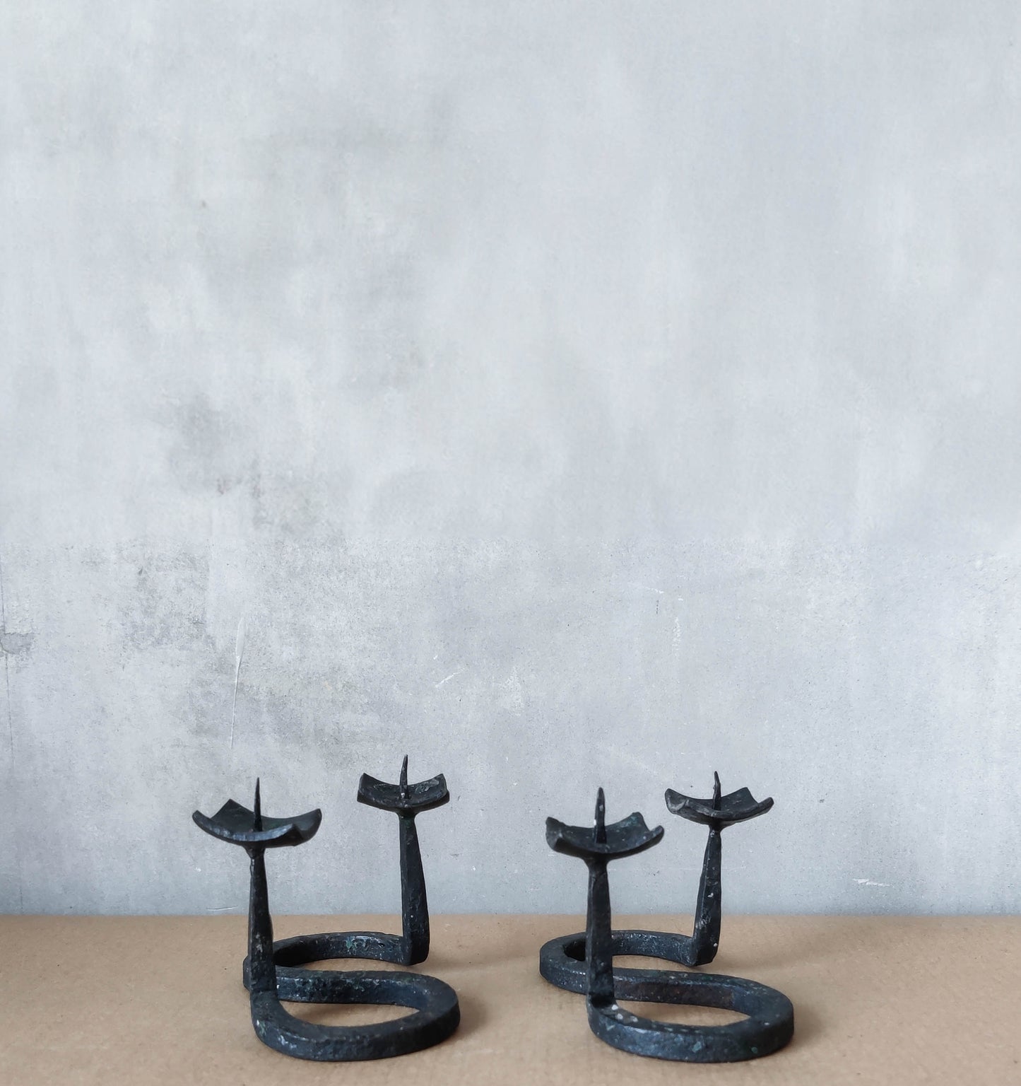 Vintage 90s pair of hand forged wrought iron S shaped twist candelabras