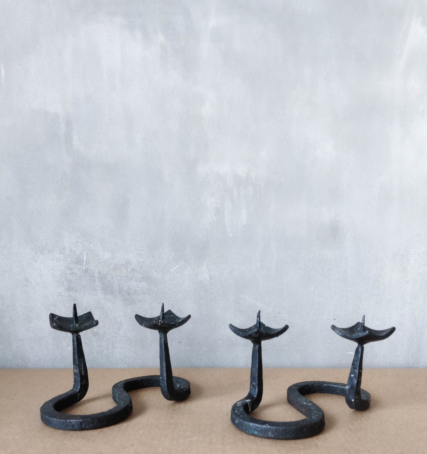 Vintage 90s pair of hand forged wrought iron S shaped twist candelabras