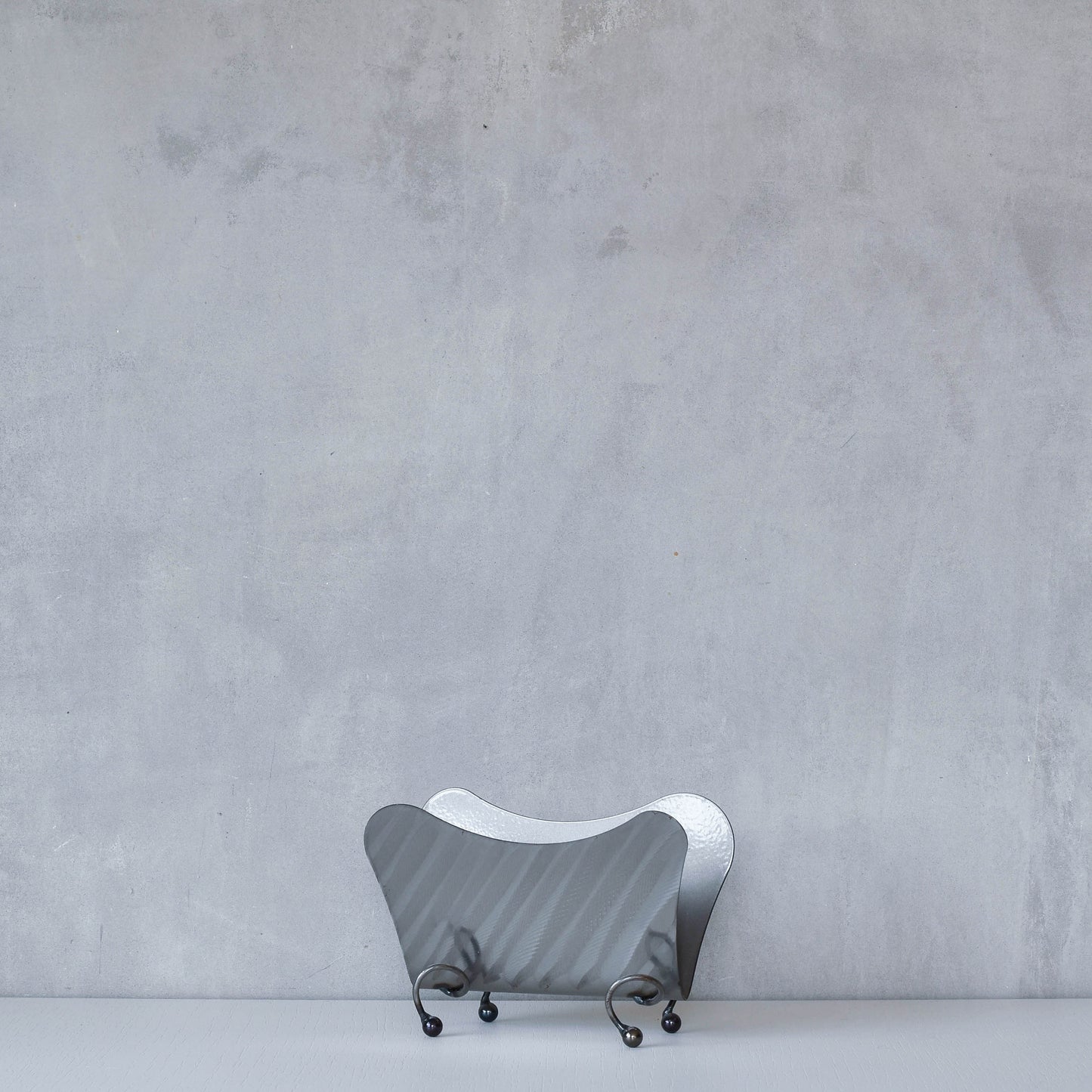 Vintage 1990s postmodern steel torch cut letter holder rack with spiral ball feet