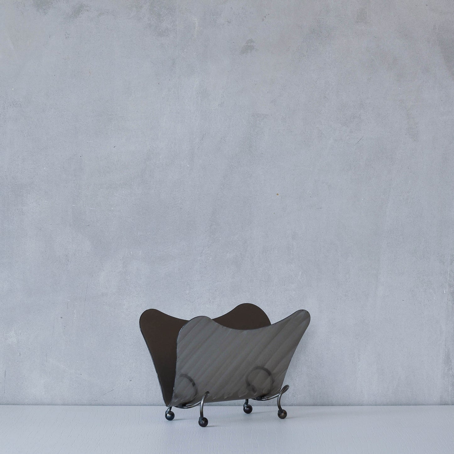 Vintage 1990s postmodern steel torch cut letter holder rack with spiral ball feet