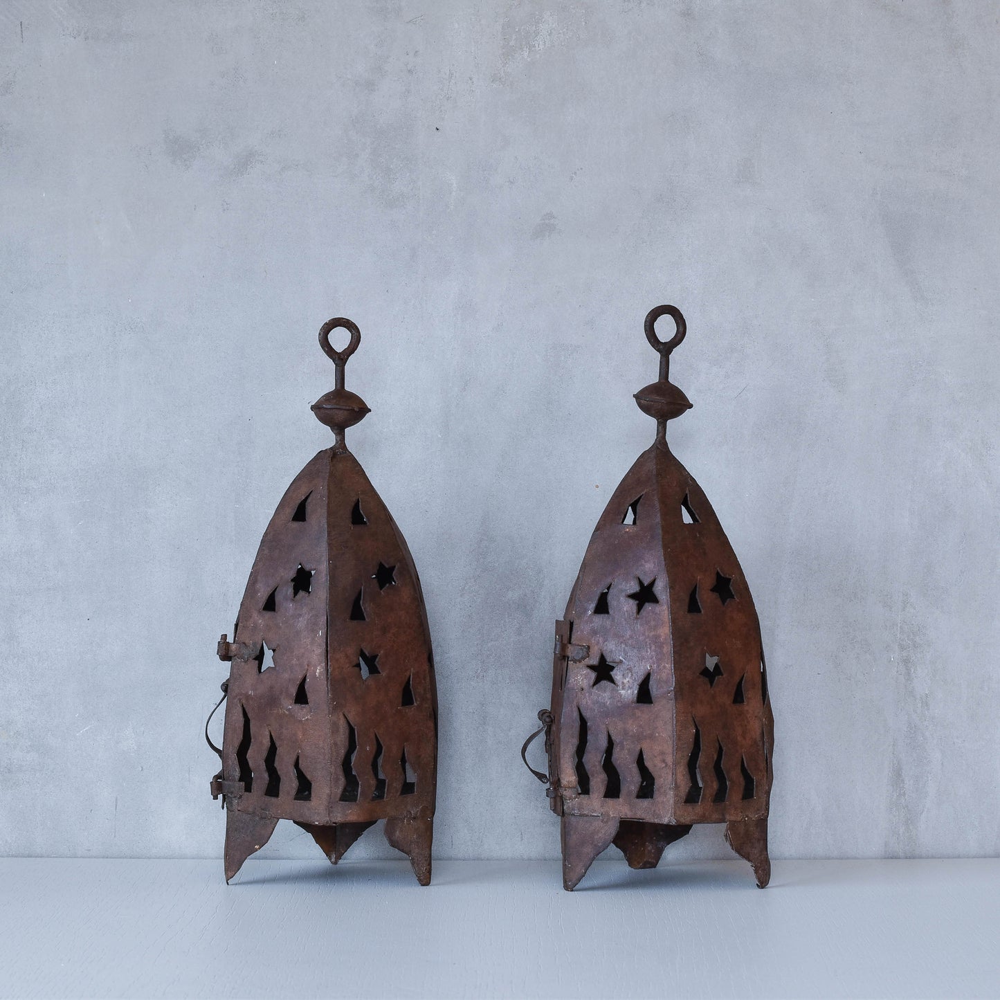 Pair vintage Moroccan sculptural welded star celestial candle holders lanterns