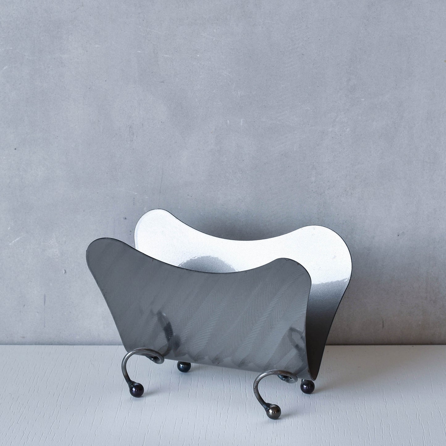 Vintage 1990s postmodern steel torch cut letter holder rack with spiral ball feet