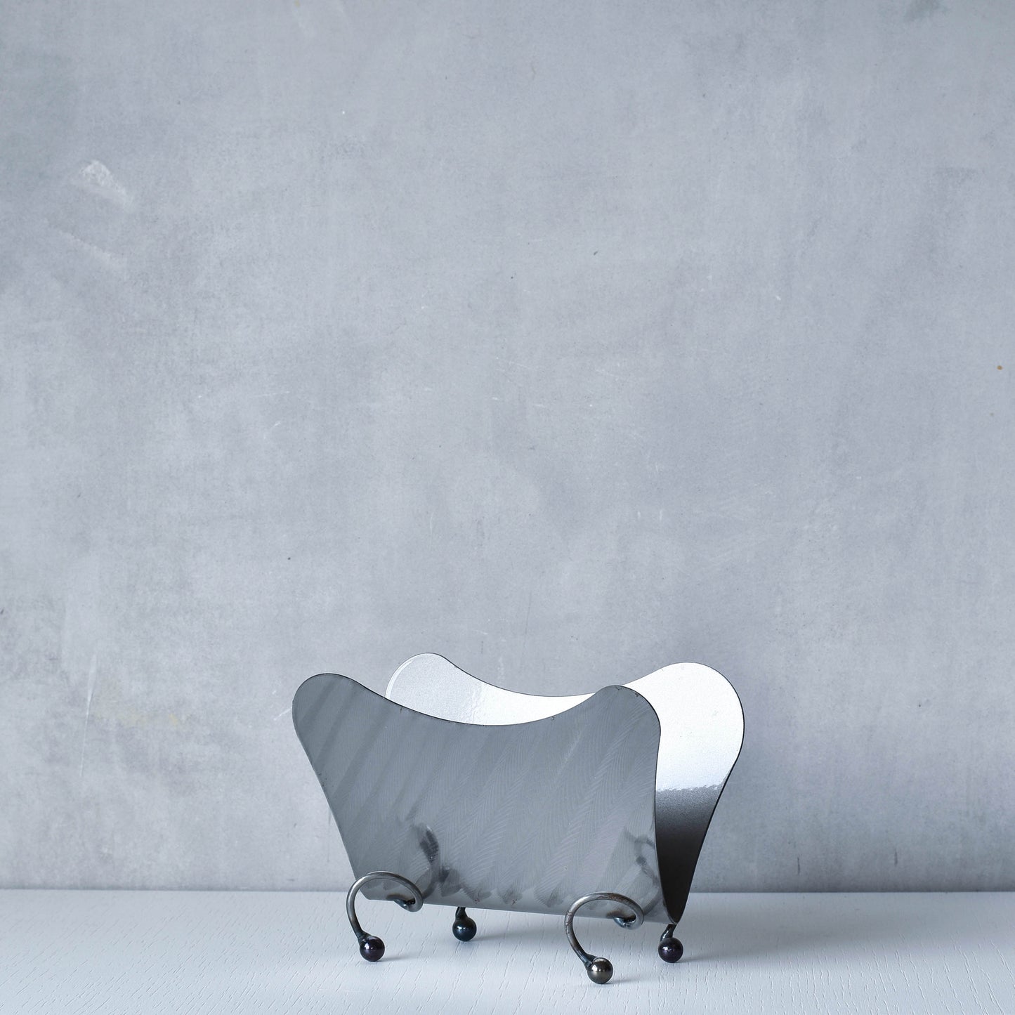 Vintage 1990s postmodern steel torch cut letter holder rack with spiral ball feet