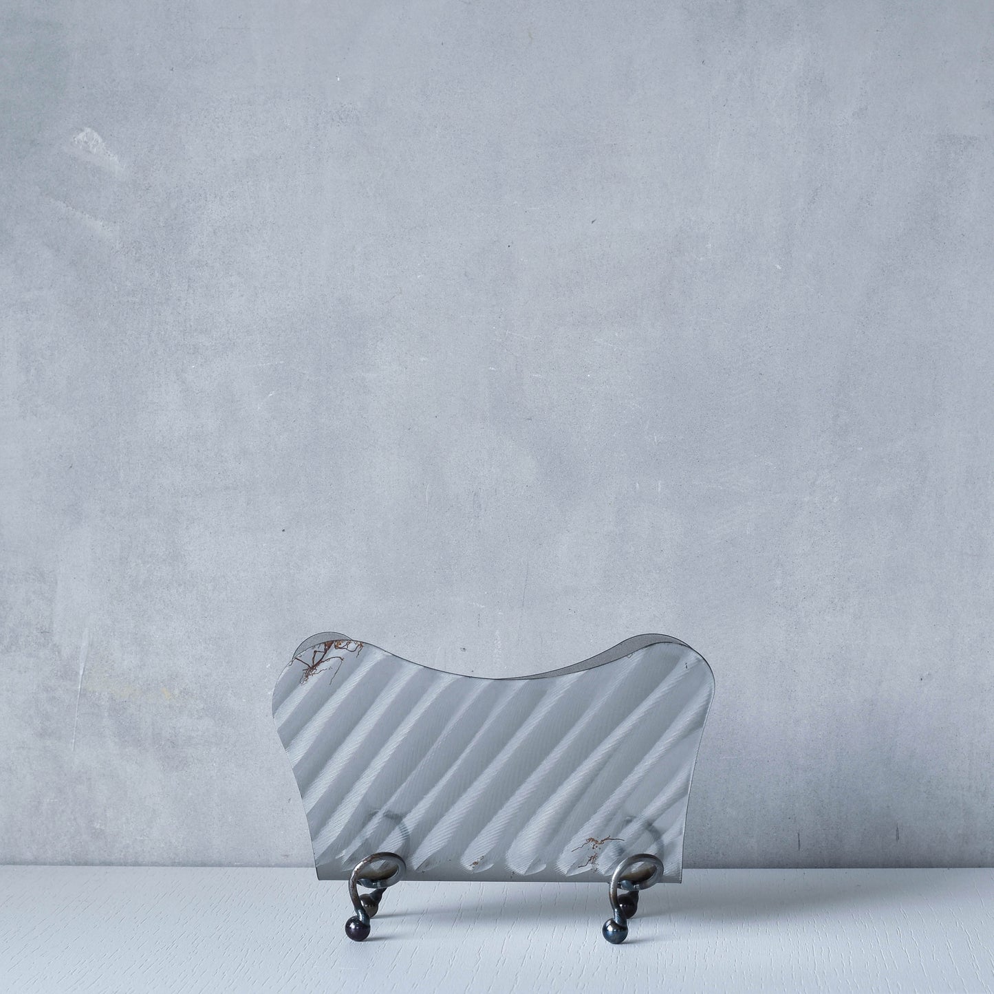 Vintage 1990s postmodern steel torch cut letter holder rack with spiral ball feet