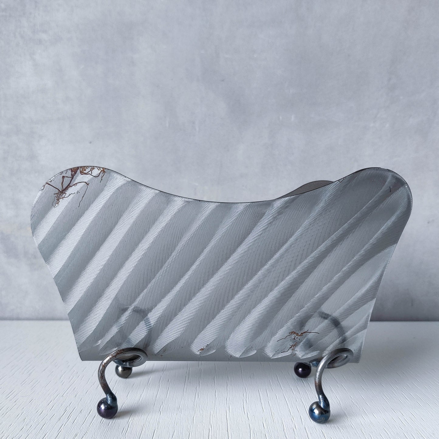 Vintage 1990s postmodern steel torch cut letter holder rack with spiral ball feet