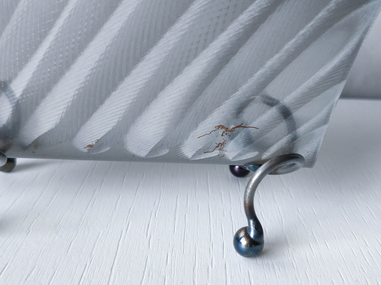 Vintage 1990s postmodern steel torch cut letter holder rack with spiral ball feet