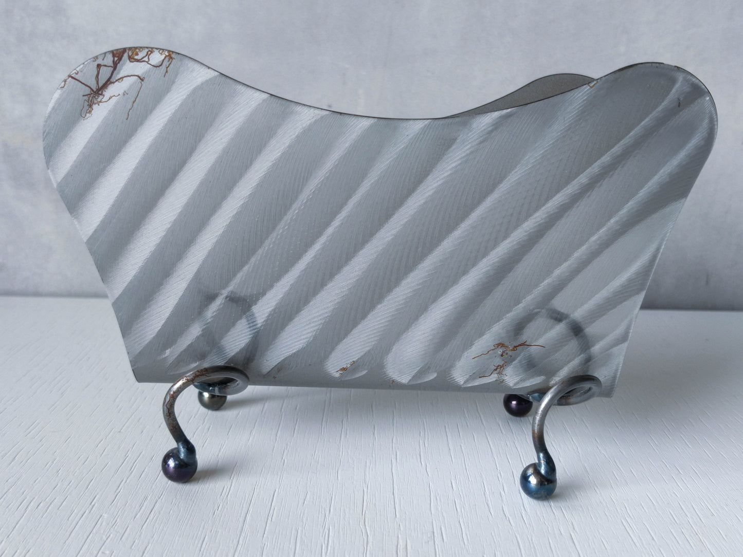 Vintage 1990s postmodern steel torch cut letter holder rack with spiral ball feet