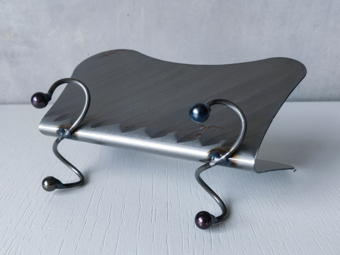 Vintage 1990s postmodern steel torch cut letter holder rack with spiral ball feet