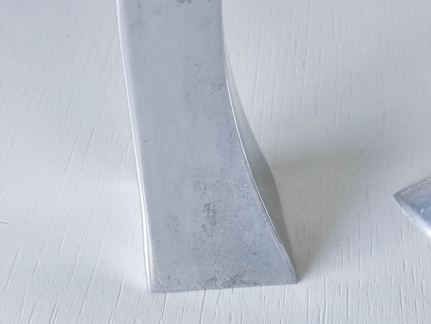 Trio of vintage aluminium Nessie Matthew Hilton style biomorphic candle holders