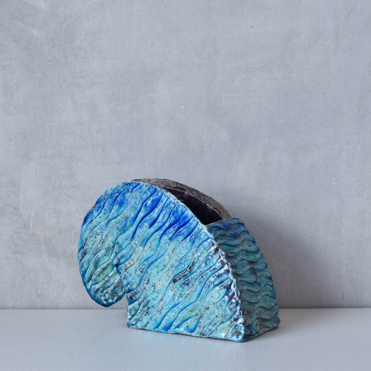 Slab built vintage artist made studio ceramic wave form vase vessel blue glazed