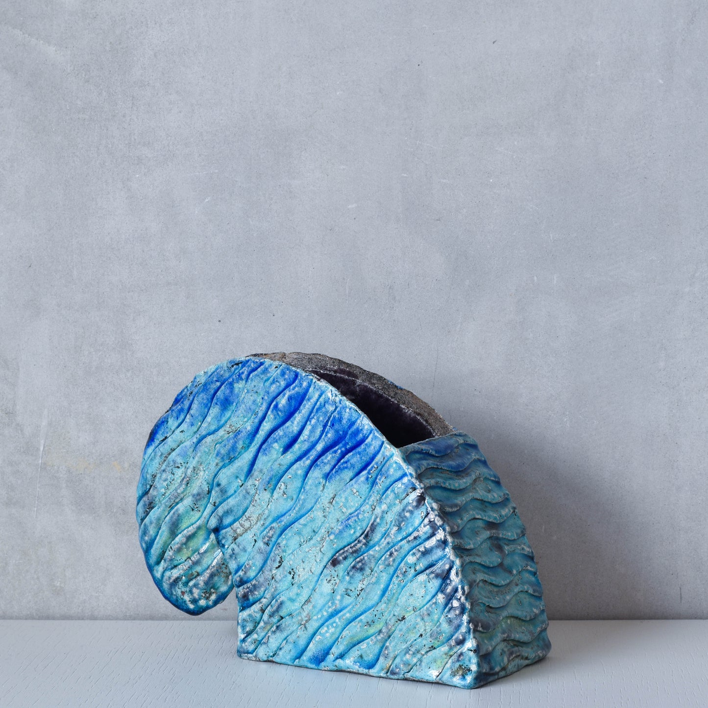 Slab built vintage artist made studio ceramic wave form vase vessel blue glazed