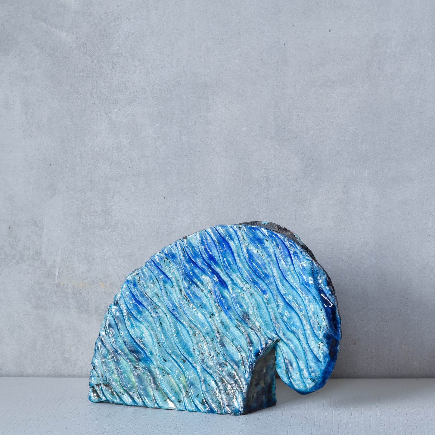 Slab built vintage artist made studio ceramic wave form vase vessel blue glazed