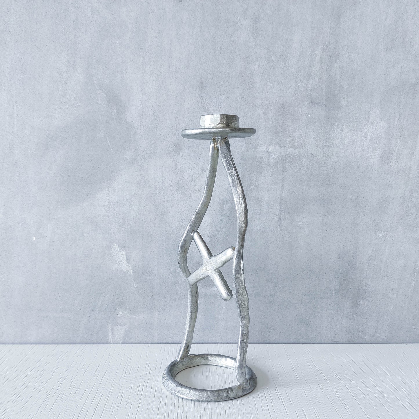 Vintage hand sand cast aluminium artisan sculpted metal cross wavy candlestick