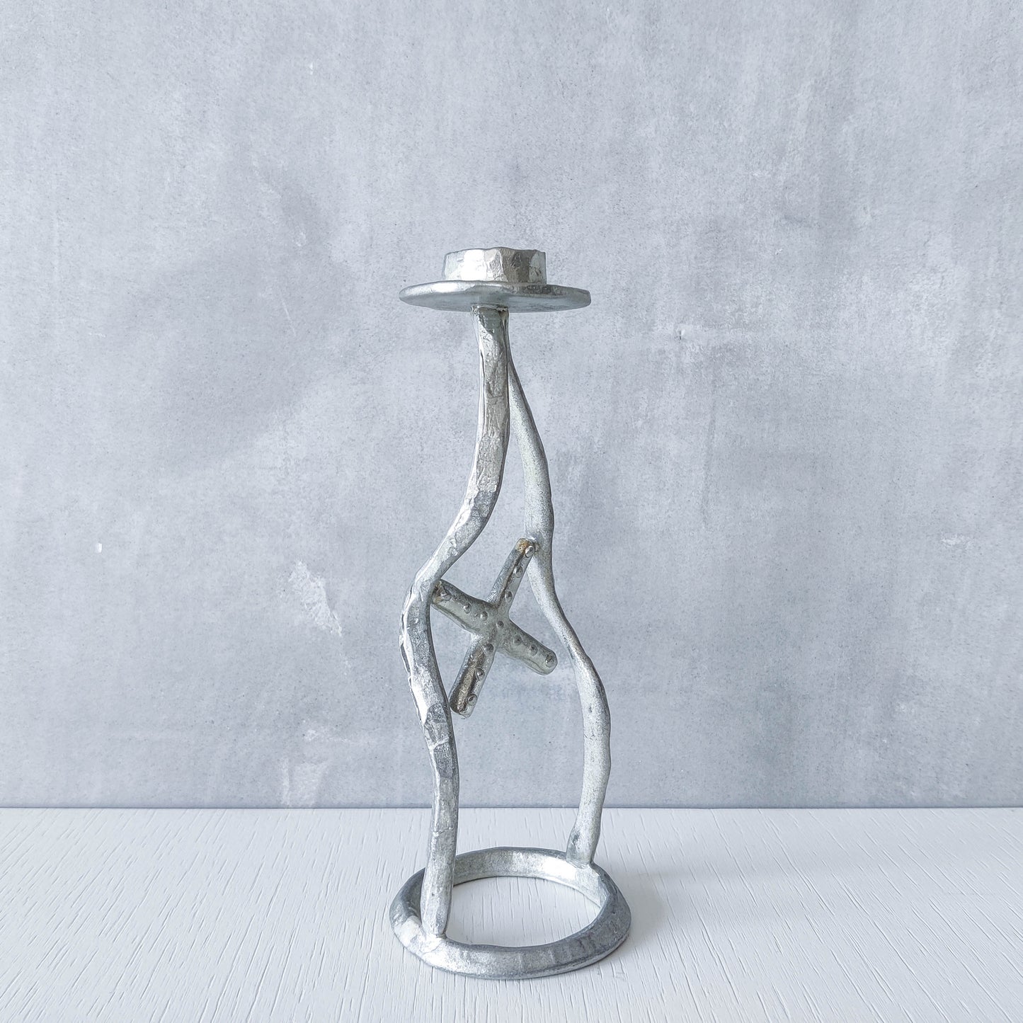 Vintage hand sand cast aluminium artisan sculpted metal cross wavy candlestick