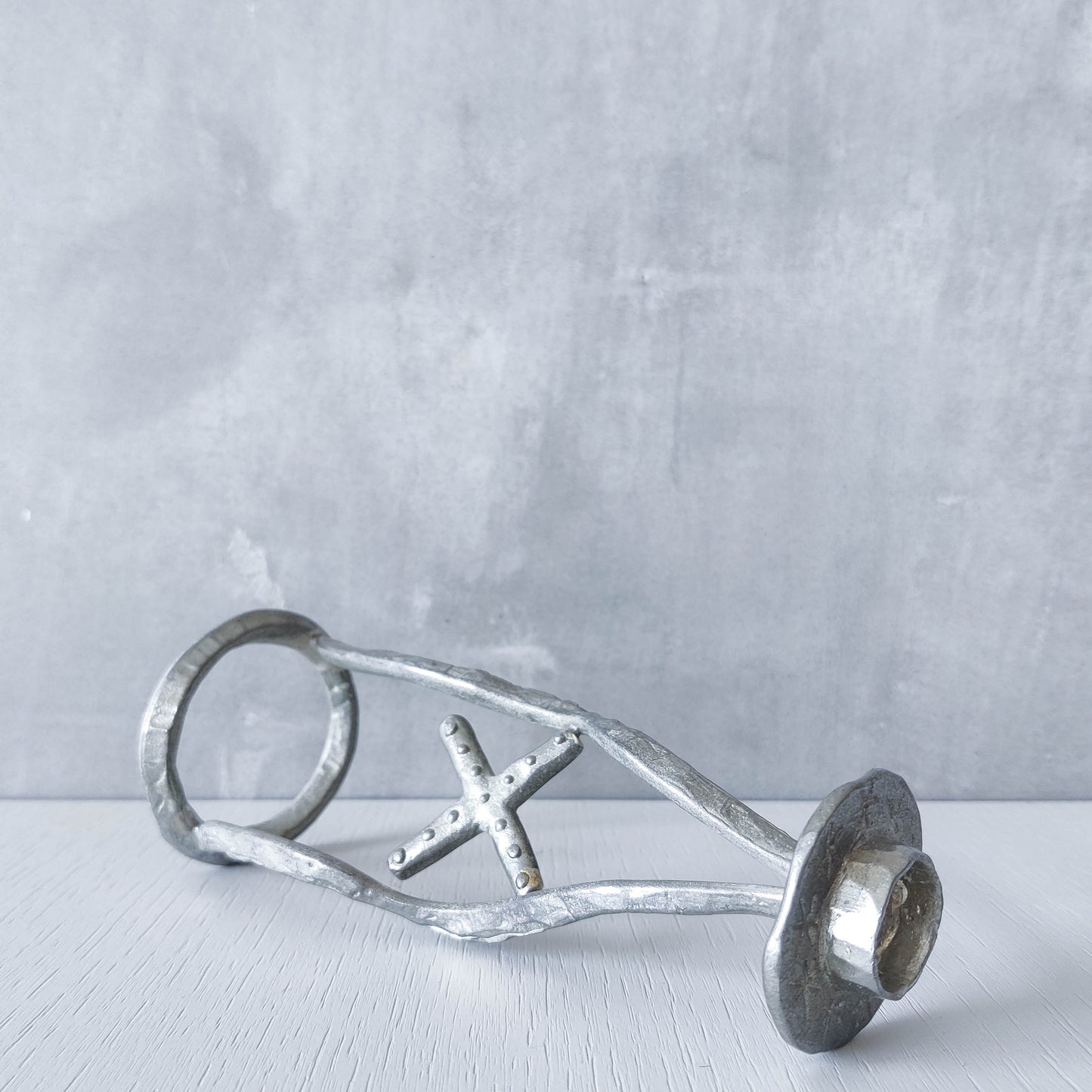 Vintage hand sand cast aluminium artisan sculpted metal cross wavy candlestick