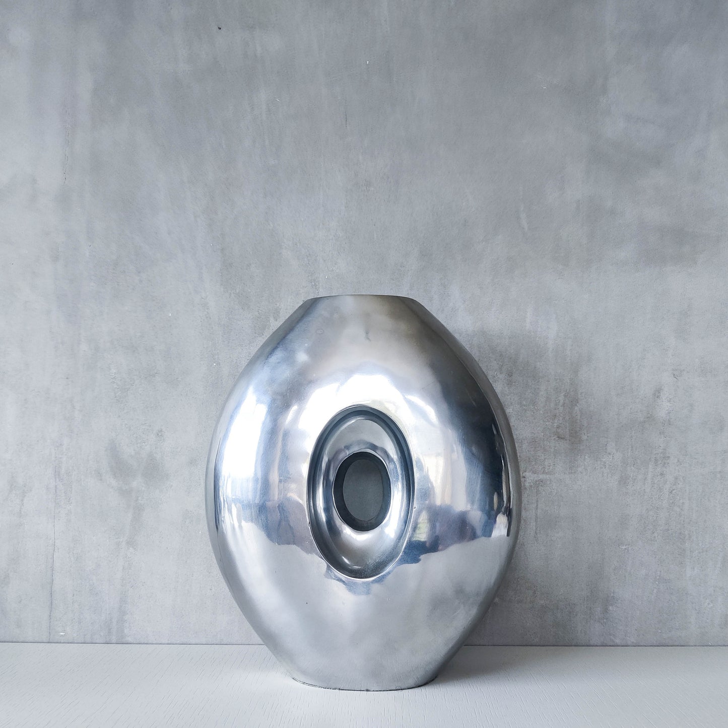 Vintage large sculptural modernist hand cast aluminium oval donut vase 32cm