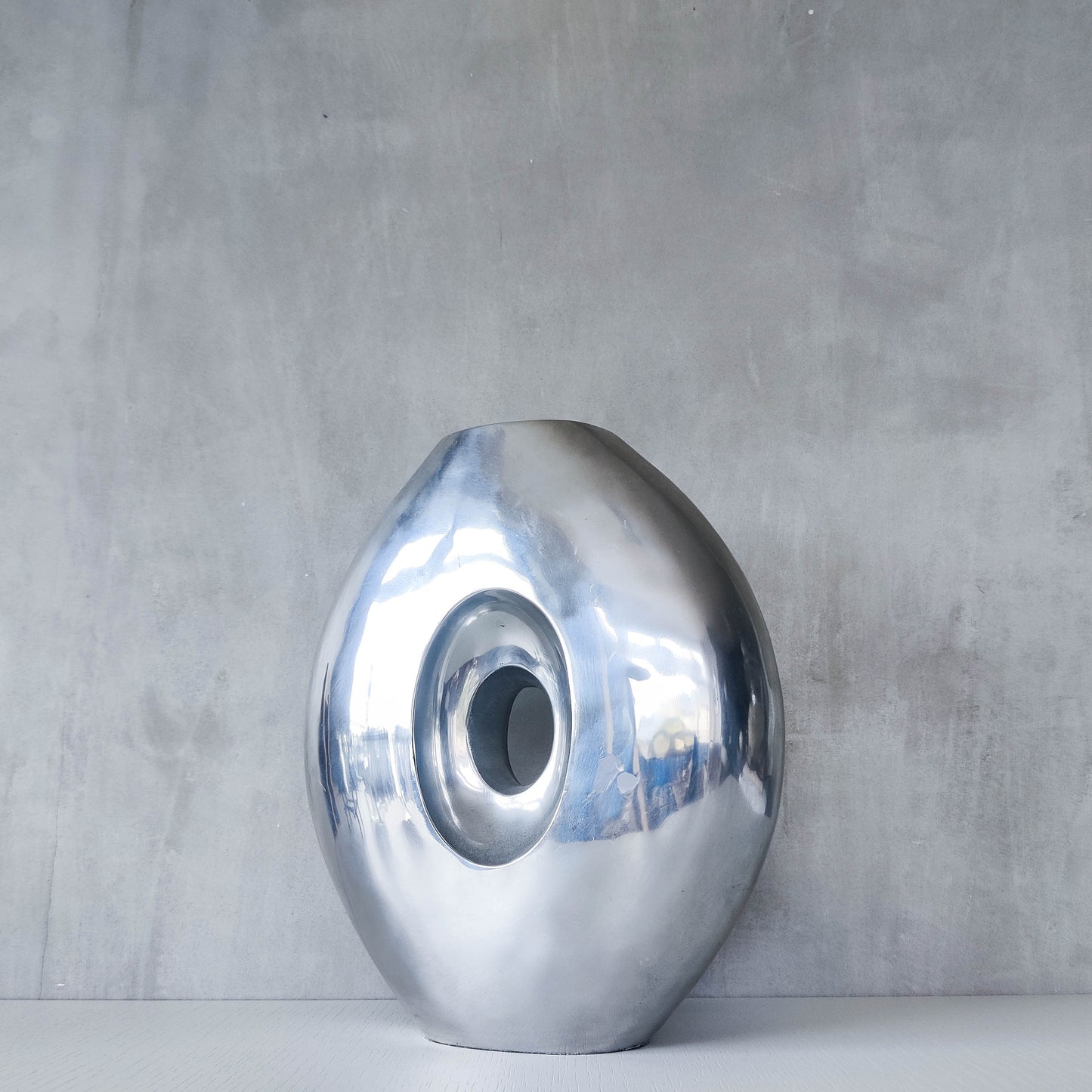 Vintage large sculptural modernist hand cast aluminium oval donut vase 32cm