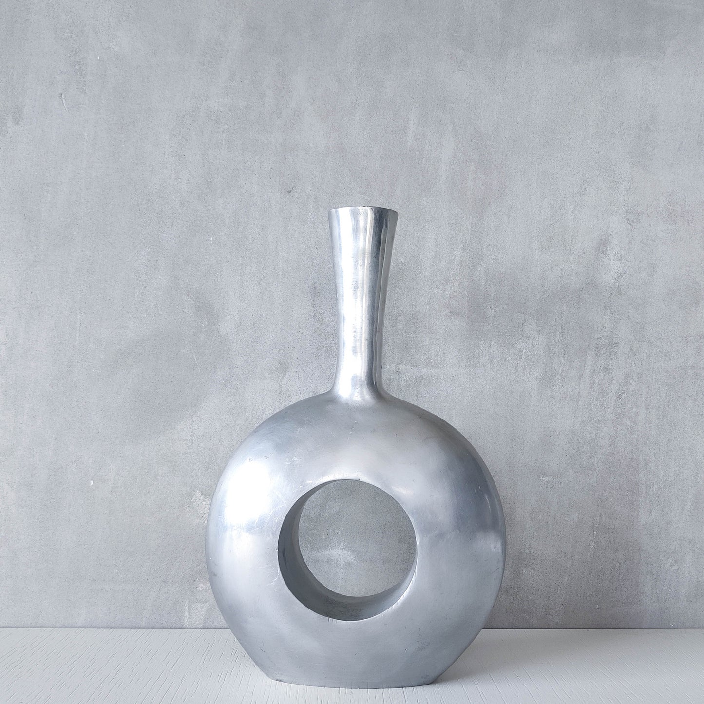 Vintage 1990s donut hand cast aluminium sculptural modernist bottle vase