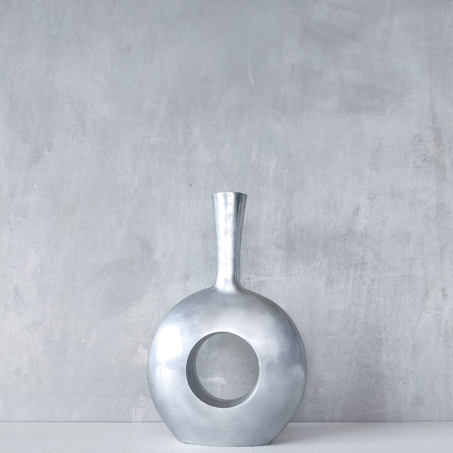 Vintage 1990s donut hand cast aluminium sculptural modernist bottle vase