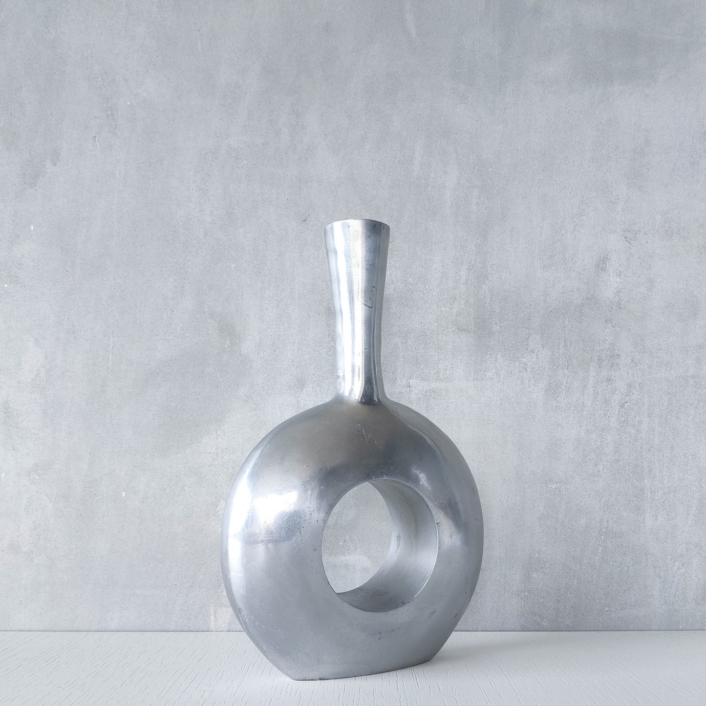 Vintage 1990s donut hand cast aluminium sculptural modernist bottle vase