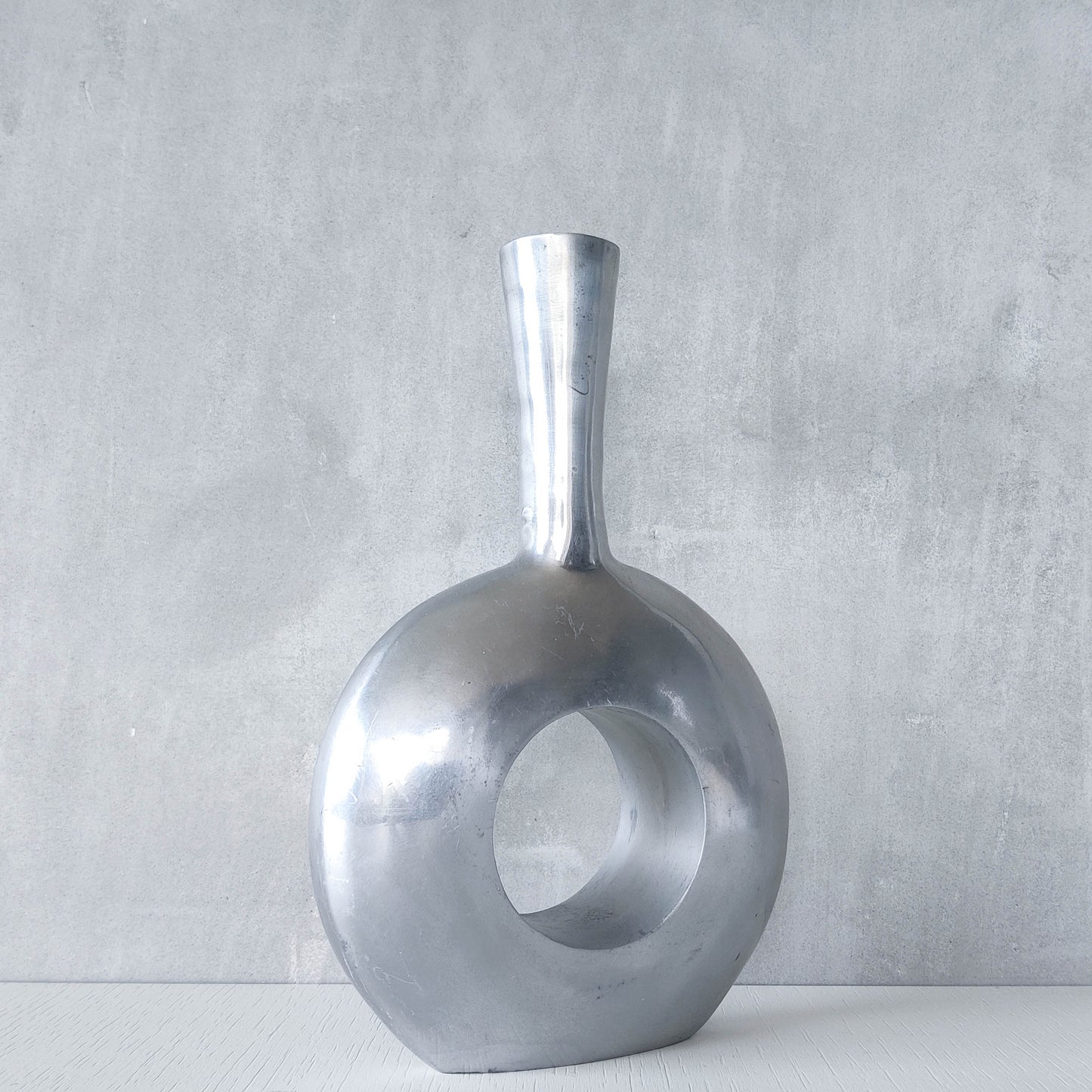 Vintage 1990s donut hand cast aluminium sculptural modernist bottle vase