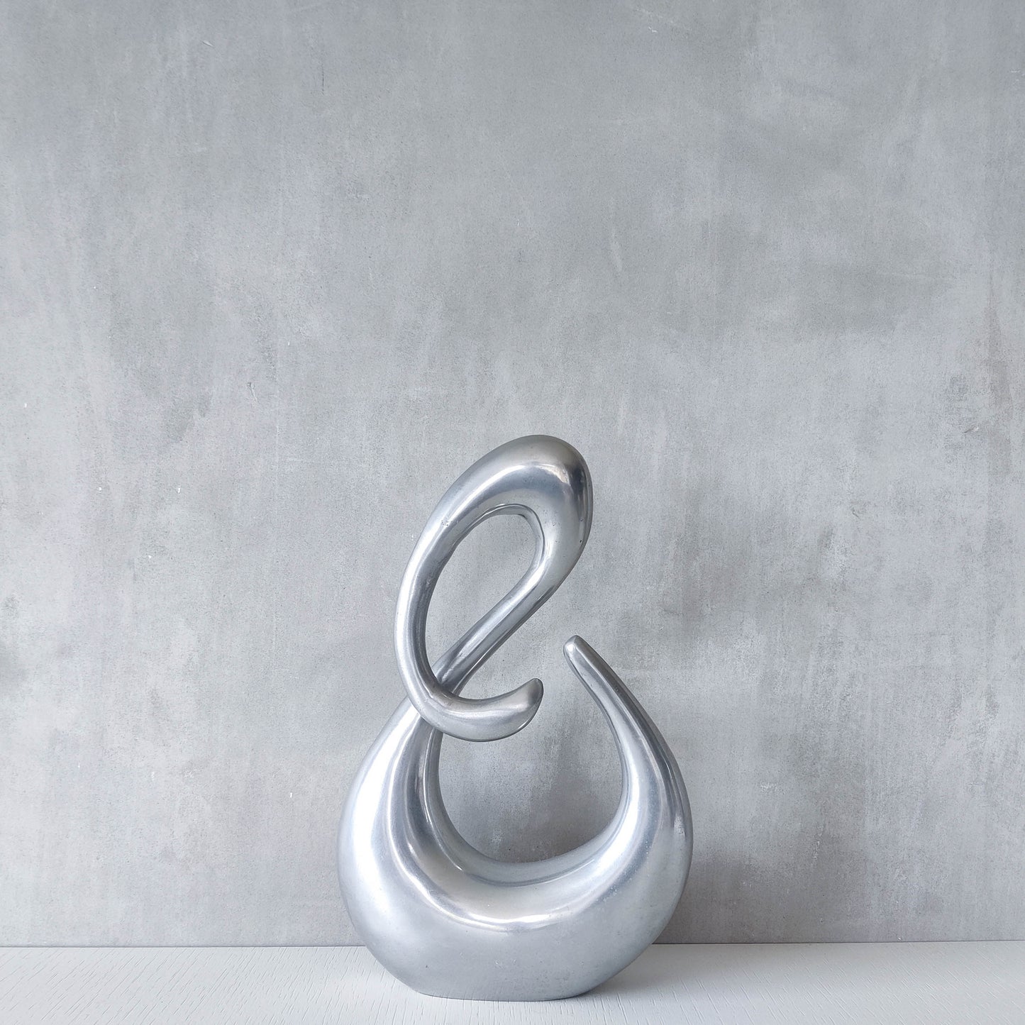 Vintage 00s sculptural sand cast aluminium sculpture wiggle twist