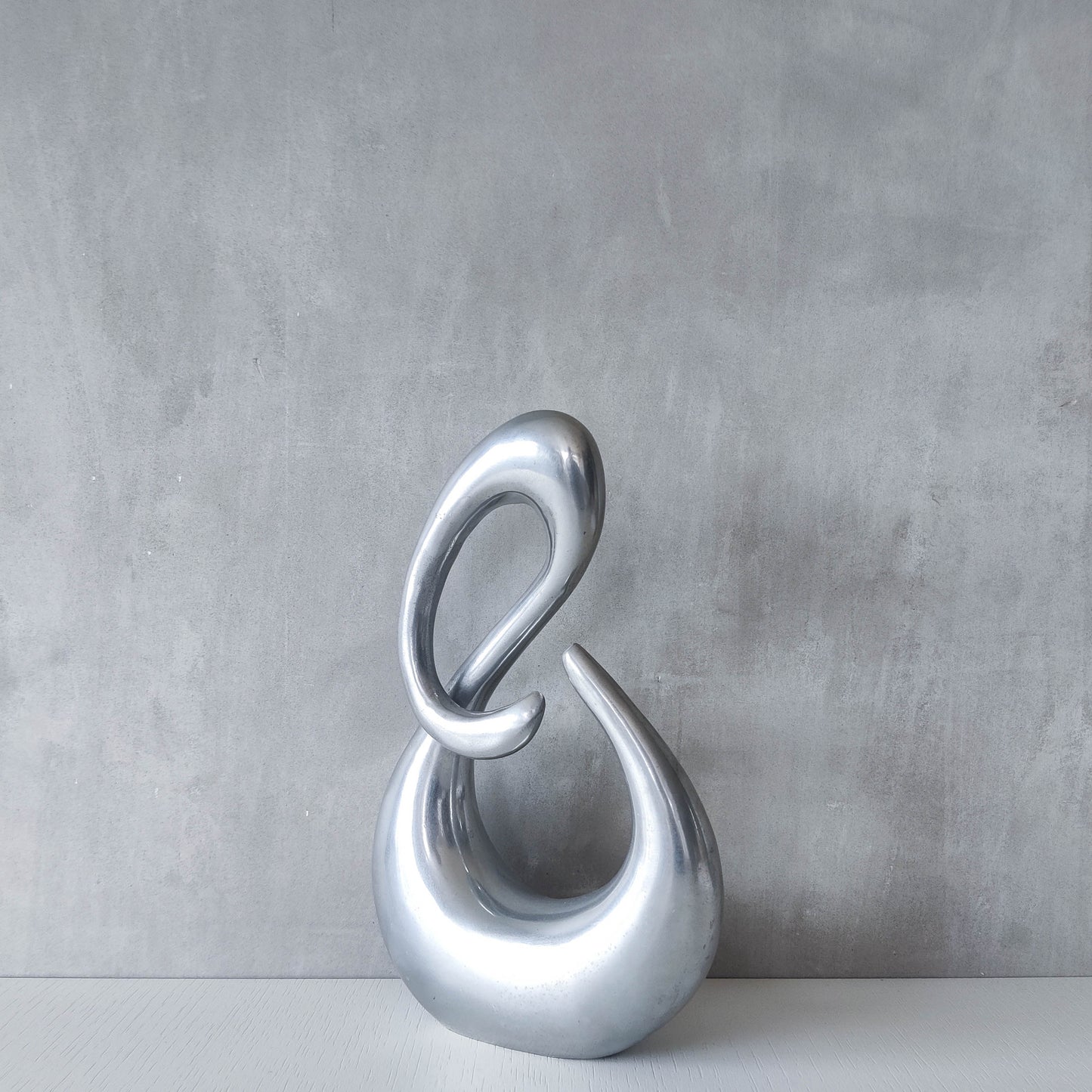 Vintage 00s sculptural sand cast aluminium sculpture wiggle twist