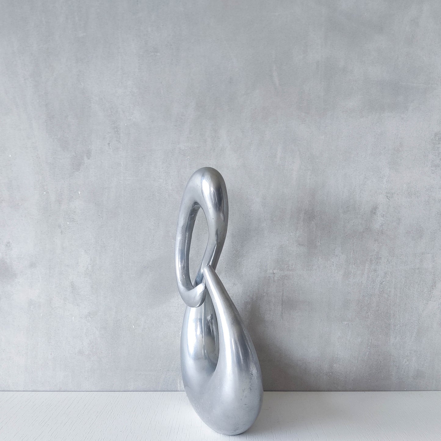 Vintage 00s sculptural sand cast aluminium sculpture wiggle twist