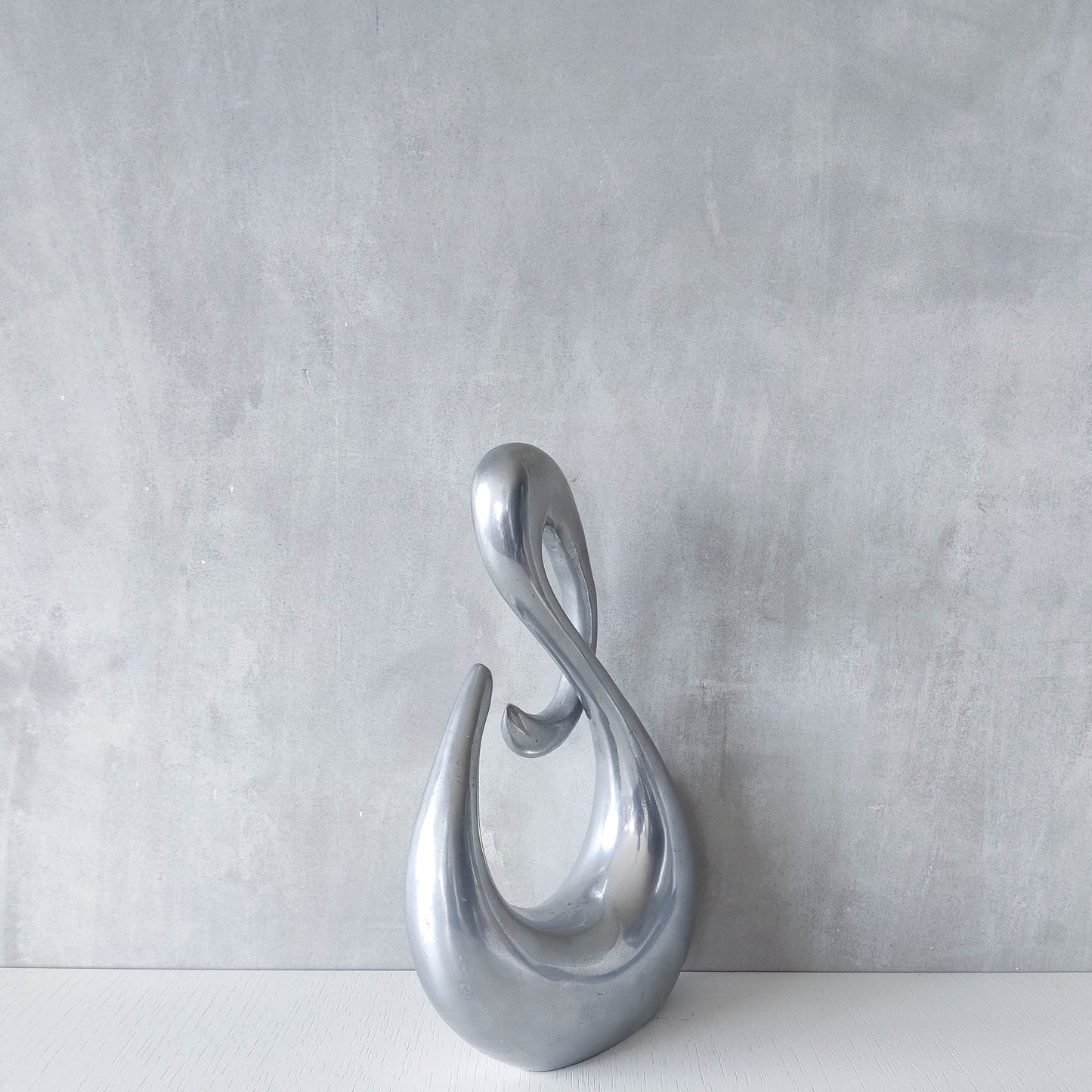 Vintage 00s sculptural sand cast aluminium sculpture wiggle twist